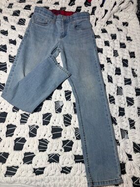 Levi's Light Blue Denim Jeans with Red Waistband Accent